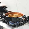 imageFarberware Glide Deep Nonstick Frying Pan  Fry Pan  Skillet with Helper Handle  125 Inch Black4 Quart
