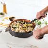 imageFarberware Glide Deep Nonstick Frying Pan  Fry Pan  Skillet with Helper Handle  125 Inch Black4 Quart