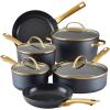 imageFarberware Forged Induction Ceramic Nonstick Pots and Pans Set with Cooking Tools Dishwasher Safe Gold Color Stainless Steel Handles 12 Piece Cookware Set  TaupeBlack