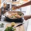 imageFarberware Millennium Stainless Steel Frying PanSkillet Induction Ready Compatible with All Cooktops Metal Utensil Safe 1225 Inch Open Fry Pan Dishwasher Safe  Stainless Steel